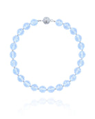 Necklace with glass light blue beads on a white background